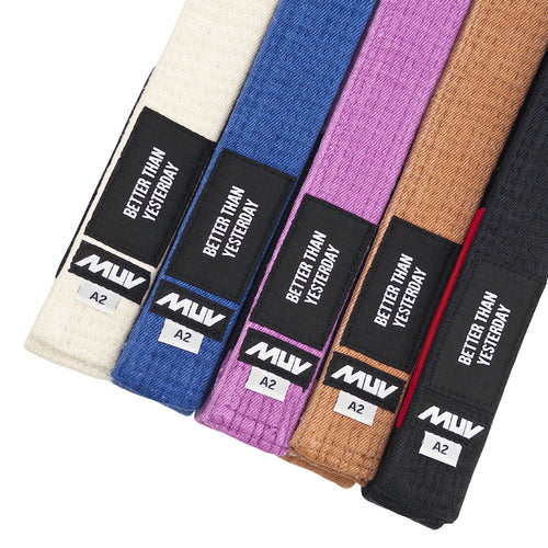 MUV relic belts in white, blue, purple, tan, and black. Each belt features a black label with the text 'BETTER THAN YESTERDAY'.