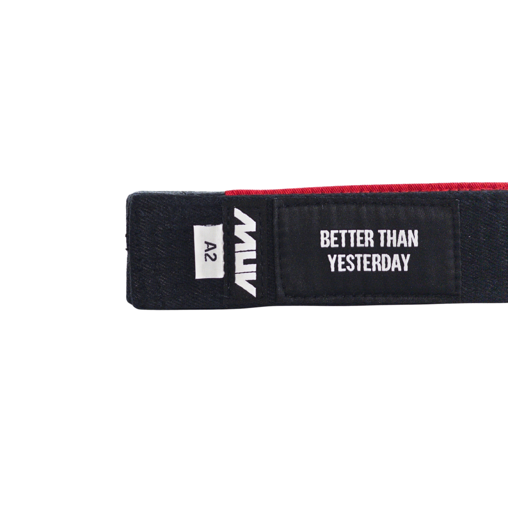 MUV Relic Belt black hemp BJJ belt with "Better Than Yesterday" label and red rank sleeve