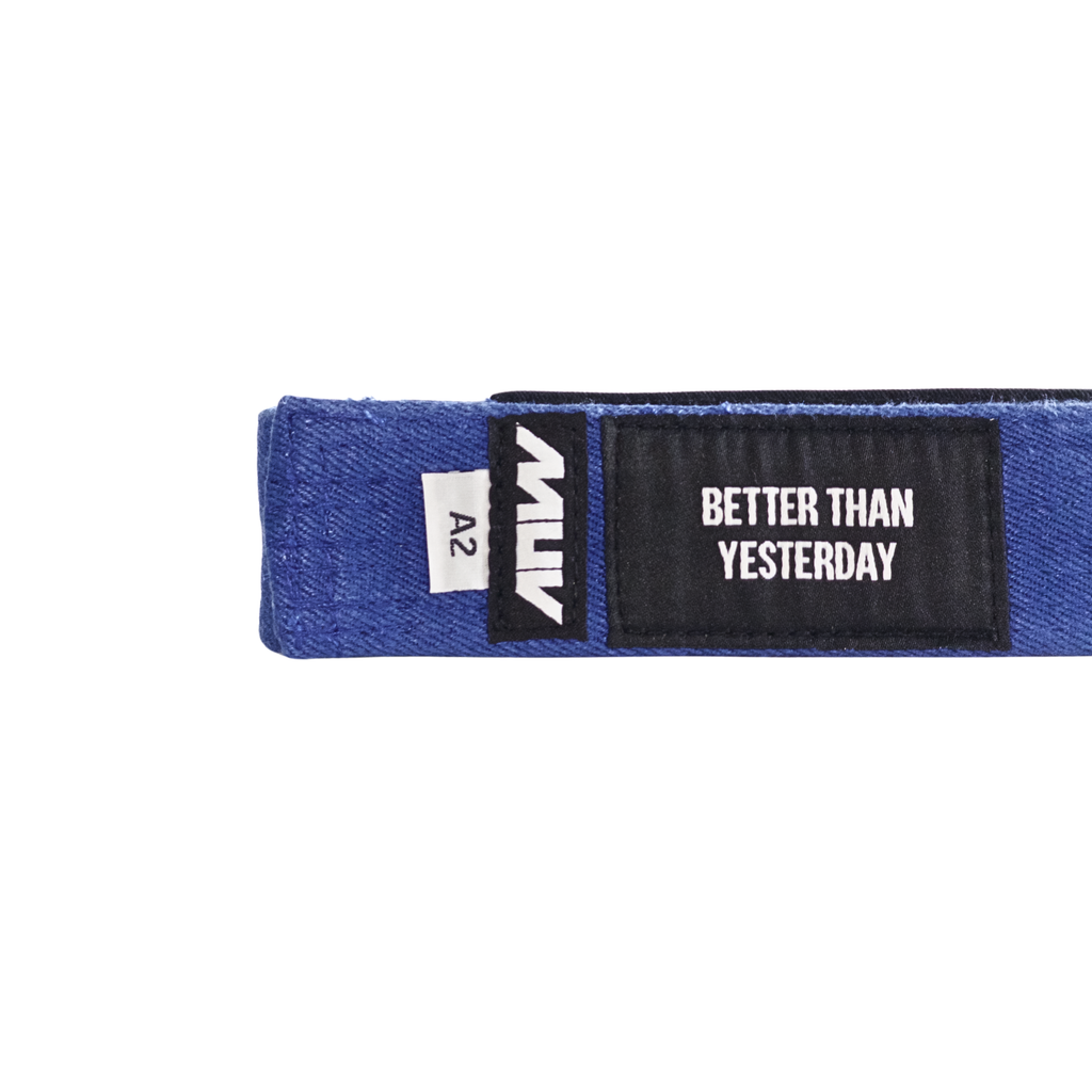 MUV Relic Belt blue hemp BJJ belt with "Better Than Yesterday" label and black rank sleeve