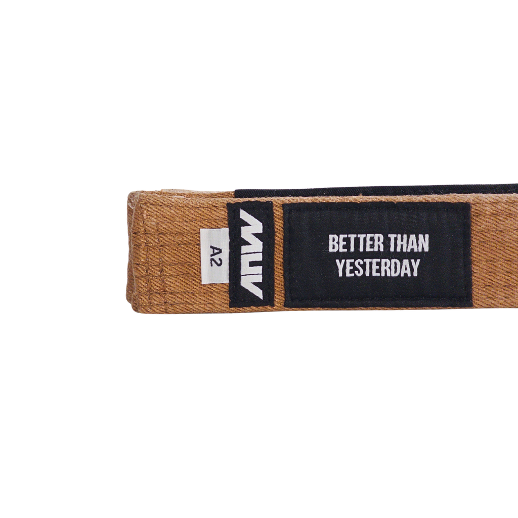 MUV Relic Brown black hemp BJJ belt with "Better Than Yesterday" label and black rank sleeve