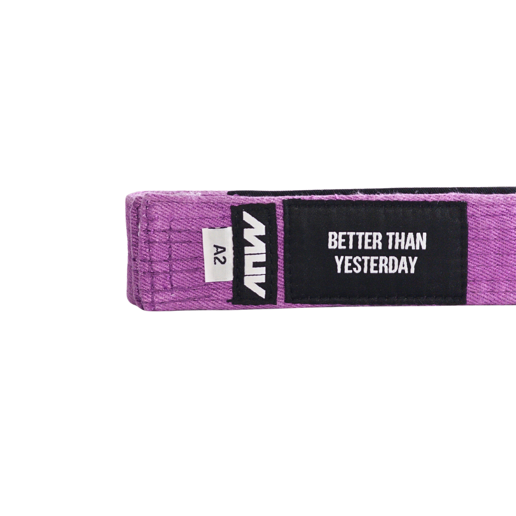 MUV Relic Belt purple hemp BJJ belt with "Better Than Yesterday" label and black rank sleeve
